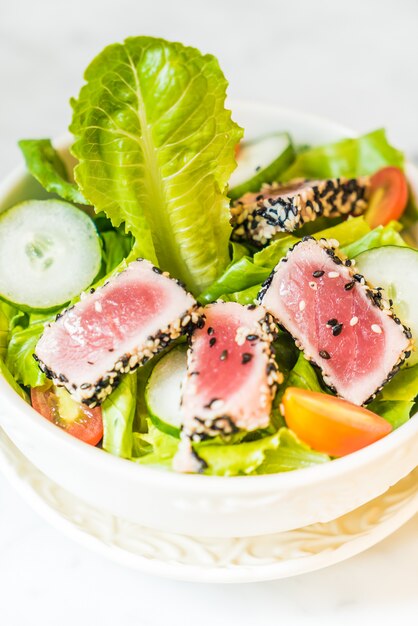 Grilled tuna salad in white bowl - healthy food