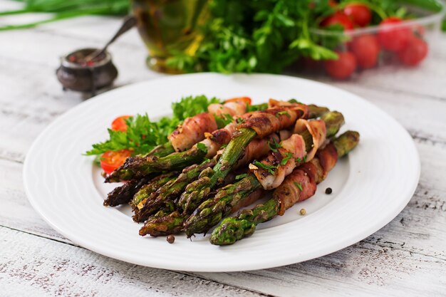 Grilled violet asparagus wrapped with bacon