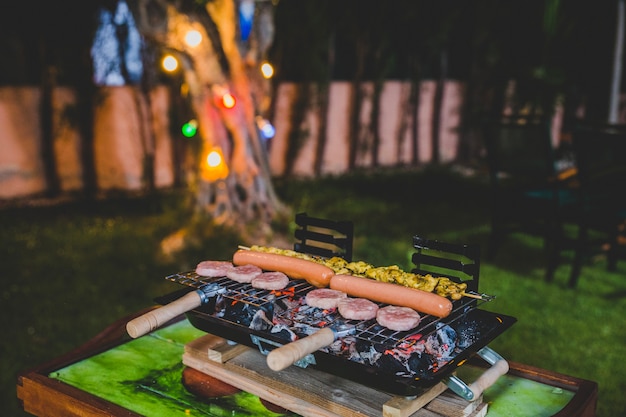 Free Photo grilling meat in the barbecue