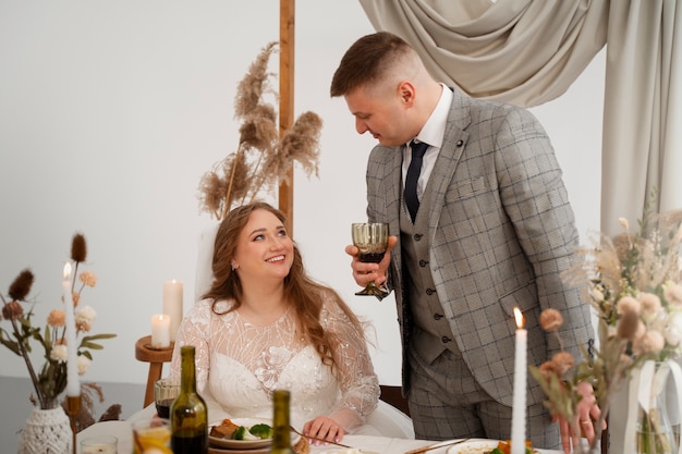 Groom giving toast to guests at his wedding