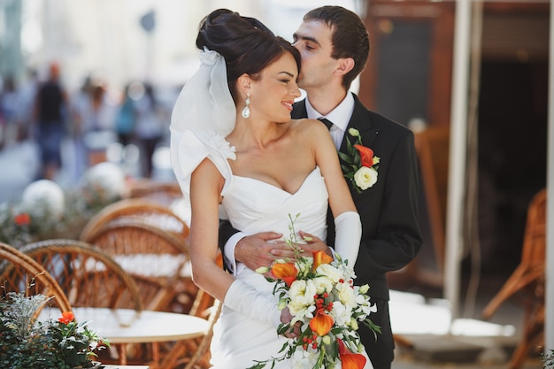 Groom kissed his wife's head