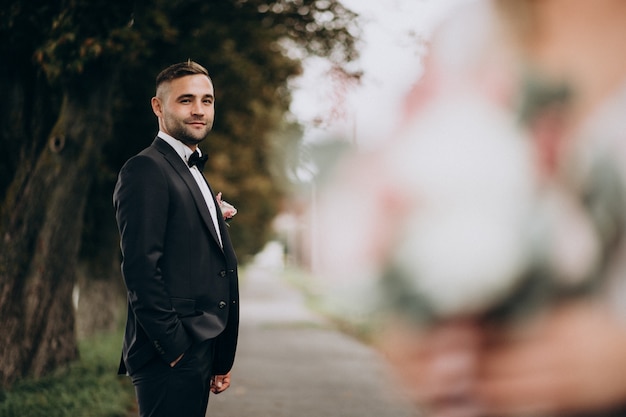 Groom on a wedding photo session