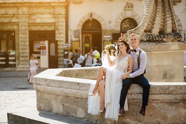 Free Photo grooms on a sunny day