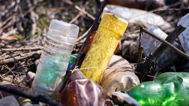 Ground littered with plastic bottles