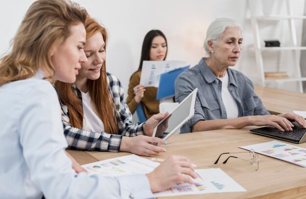 Group of adult women working together