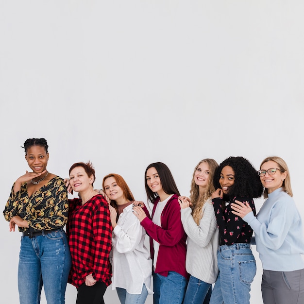 Group of best friends posing with copy space