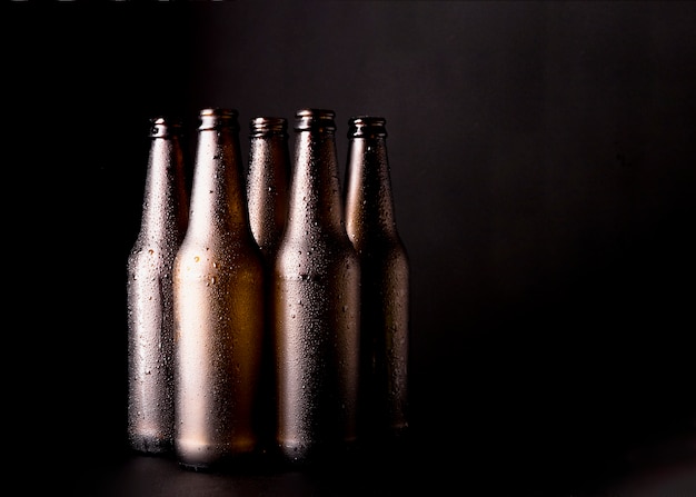 Group of black beer bottles