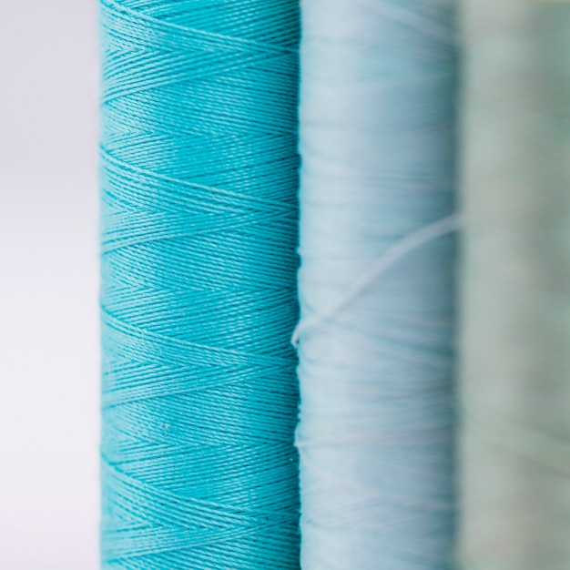 Free photo group of blue thread reels