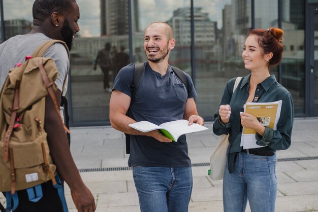 Group of cheerful people with documents