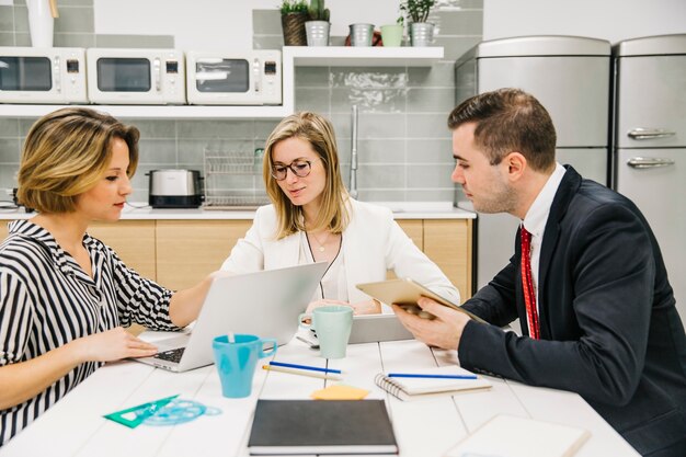 Group of coworkers discussing business