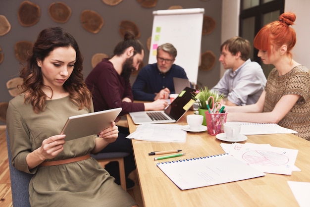 Group of creative people analyzing the result of work