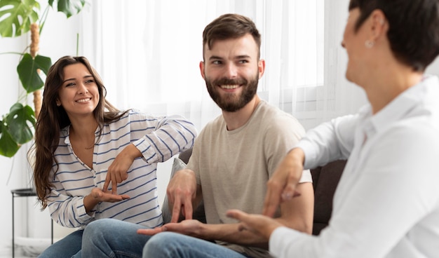 Group of deaf people communicating through sign language