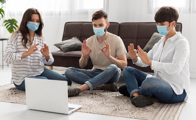 Group of deaf people communicating through sign language