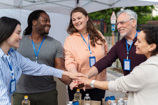 Free Photo group of different people volunteering at a foodbank