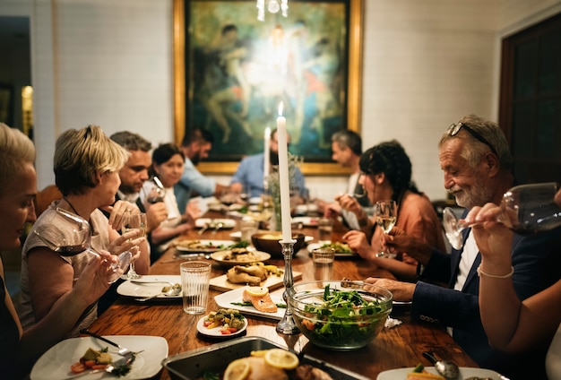 Group of diverse friends are having a dinner together