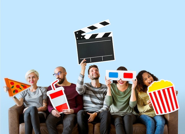 Free Photo group of diverse friends holding movie emoticons