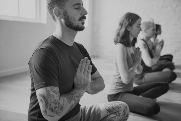 Free photo group of diverse people are joining a yoga class