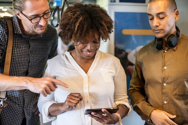 Group of diverse people using a smartphone