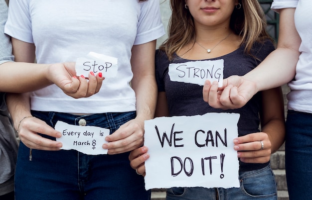 Free photo group of female activist marching together