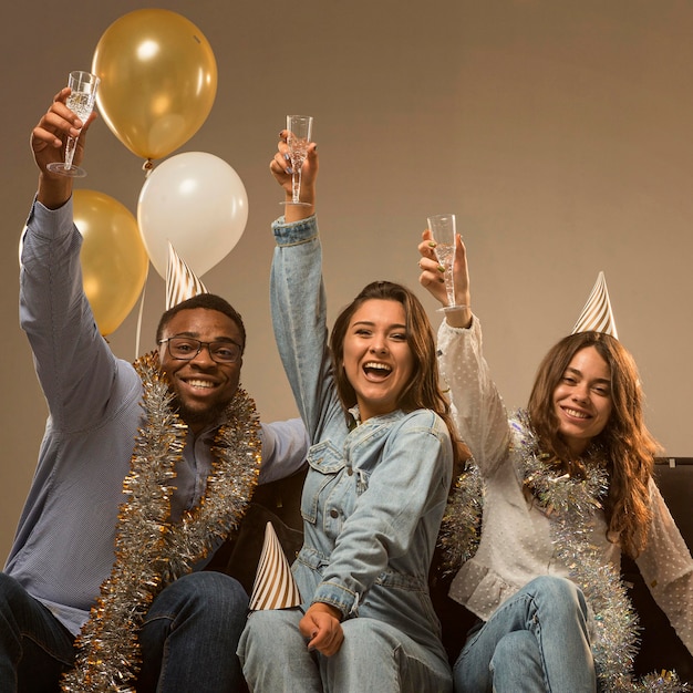 Group of friends celebrating new year concept