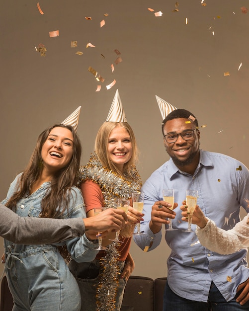 Group of friends celebrating new year concept