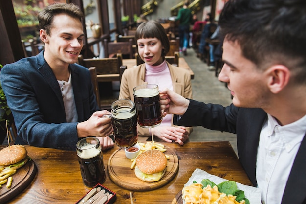 Group of friends eating in restaurant