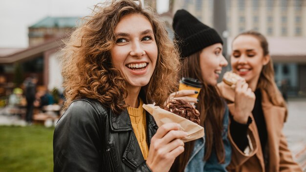 Group of friends enjoying sweets together