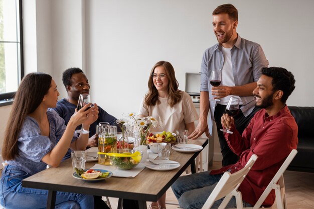 Group of friends enyoing a dinner party