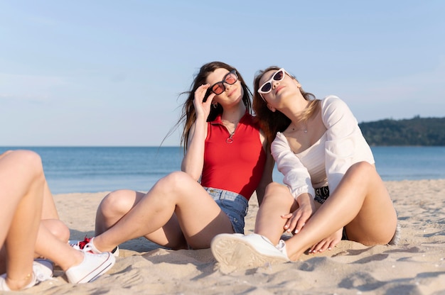 Group of friends having fun at beach