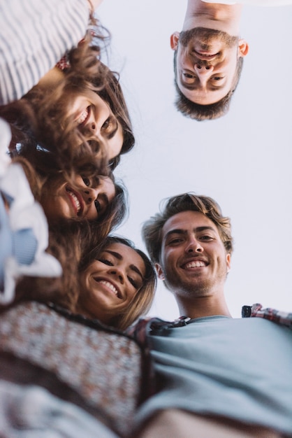 Free photo group of friends looking down