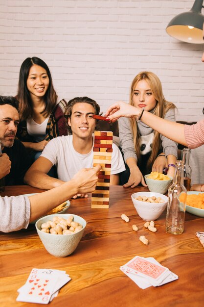 Group of friends playing tabletop game