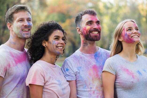 Group of friends posing while looking away