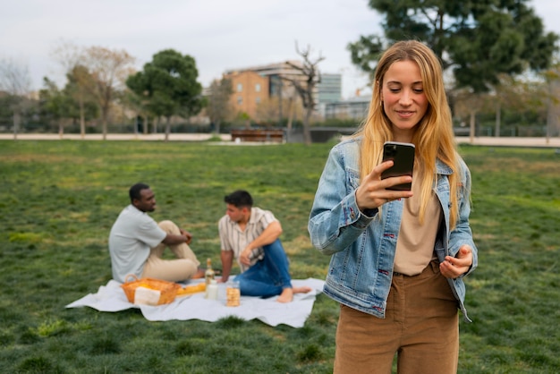 Group of friends reading cell phone messages