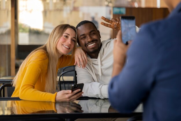 Group of friends reading cell phone messages