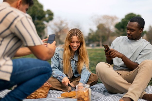 Group of friends reading cell phone messages