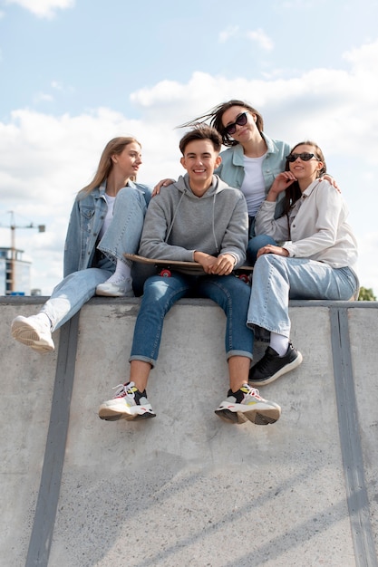 Free photo group of friends spending quality time together outdoors