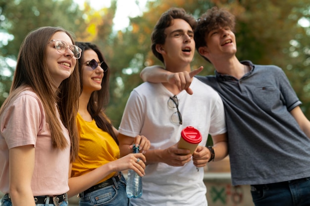 Group of friends spending time together outdoors in the park