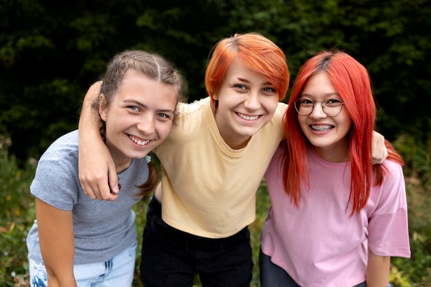 Free photo group of girl best friends posing together