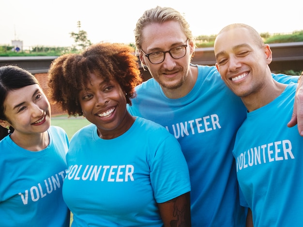 Group of happy and diverse volunteers