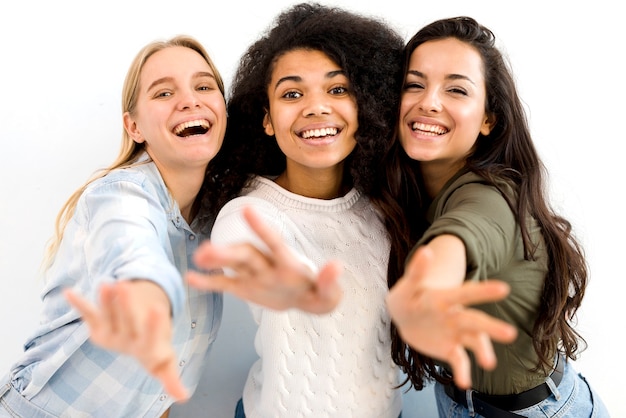 Group of happy young women smiling