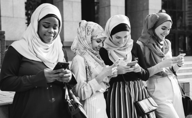 Group of islamic girls using smart phone