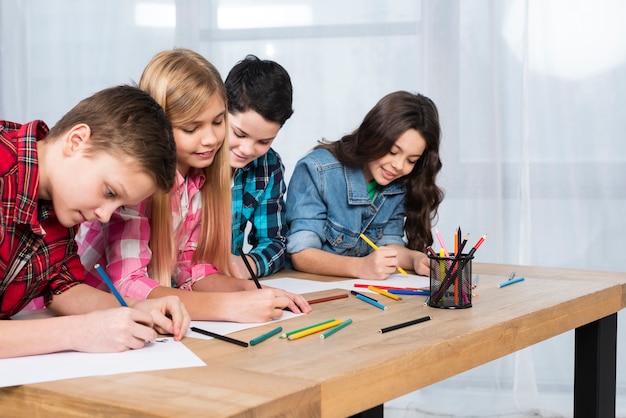 Group of kids coloring