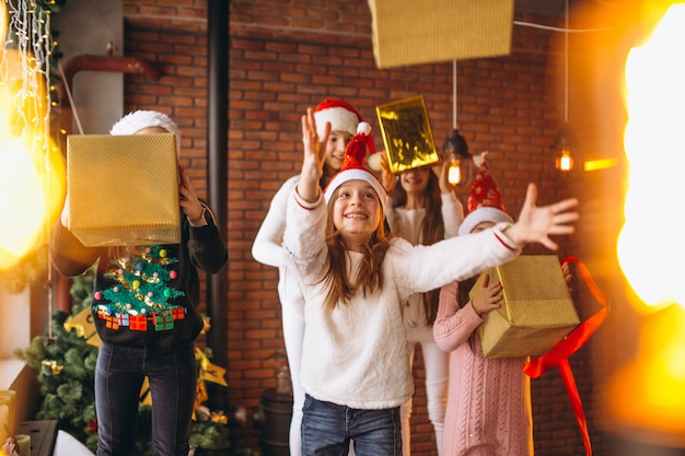 Free photo group of kids with christmas presents