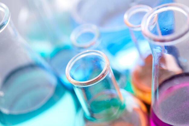 Group of laboratory flasks filled with liquid