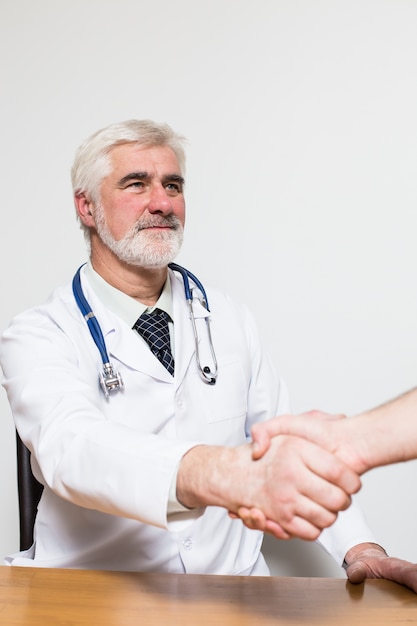 group looking cabinet one physician aged