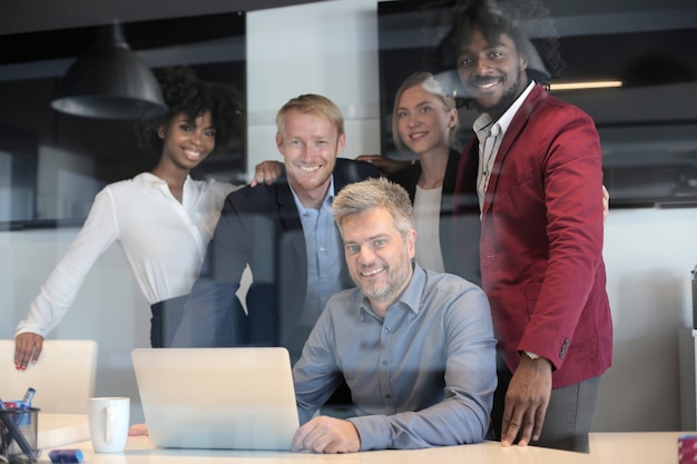 Free photo group of multiethnic business partners having a creative business team meeting in a modern office