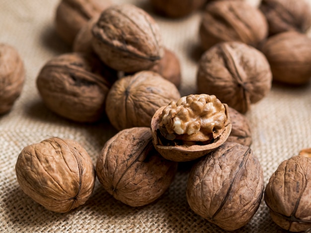 Group of nuts on brown background