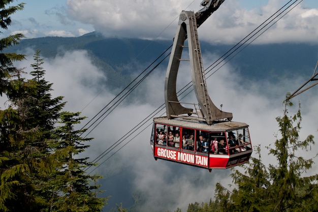 Free photo group of people going up to mountain