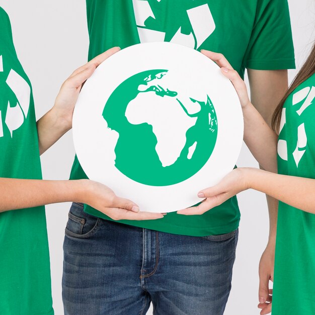 Group of people holding ecological sign