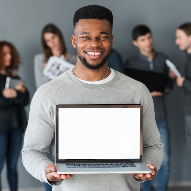 Group of people holding laptop template